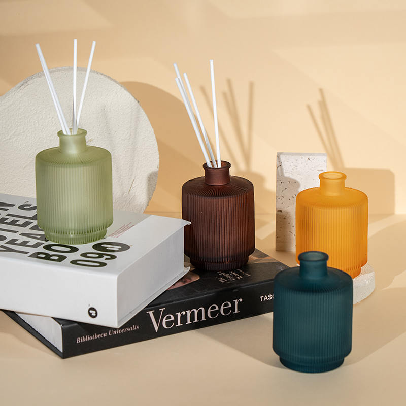 Sirkulær vertikal stripe gjennomsiktig glassflaske siv diffuser - hjemmeduft siv diffuser produsent